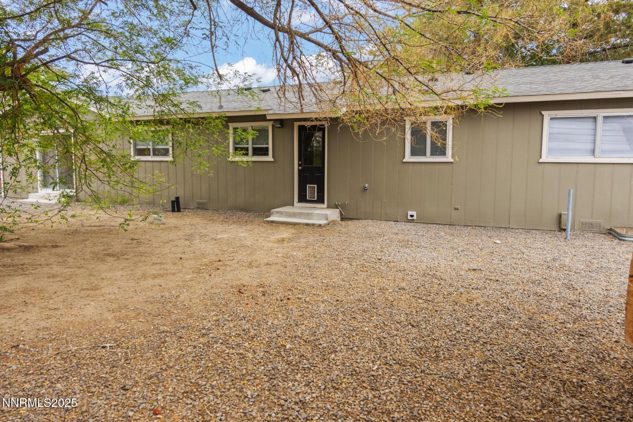 859 B Street Fernley, NV 89408 - Photo 27 of 32 a view of an house with backyard