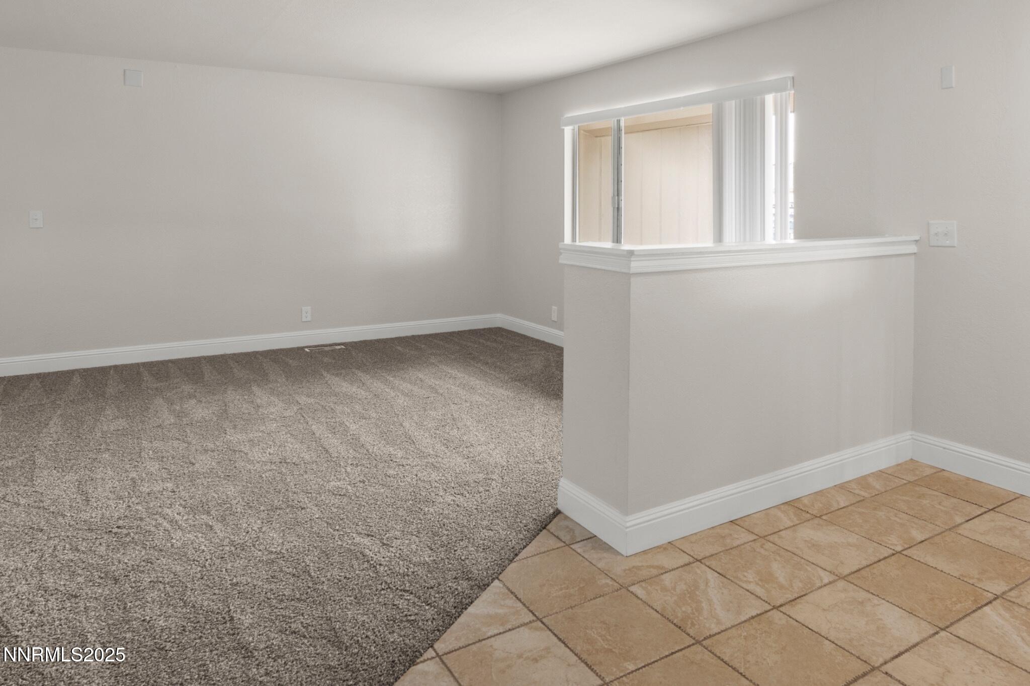 859 B Street Fernley, NV 89408 - Photo 4 of 32 an empty room with windows