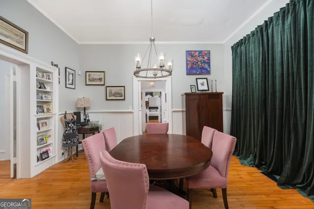 a view of a livingroom with furniture and wooden floor