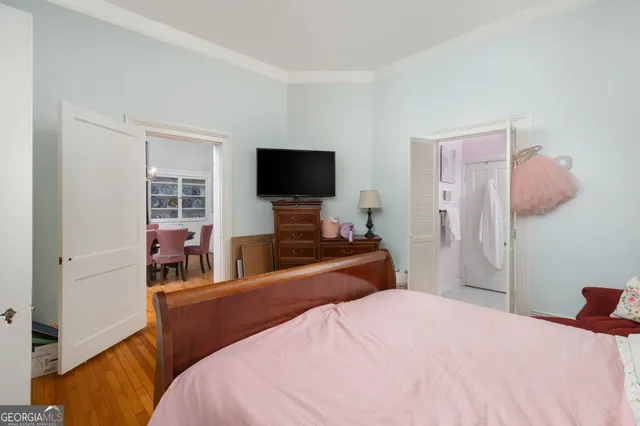a bathroom with a sink toilet and a mirror