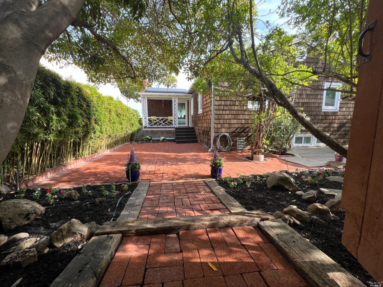 32 Alta Vista Way San Rafael, CA 94901 - Photo 1 of 1 a front view of a house with garden