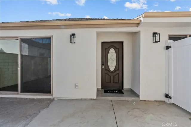 a view of kitchen with furniture and wooden floor