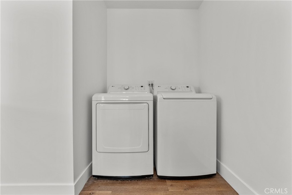 7419 Gloria Avenue Van Nuys, CA 91406 - Photo 41 of 51 a utility room with dryer and washer