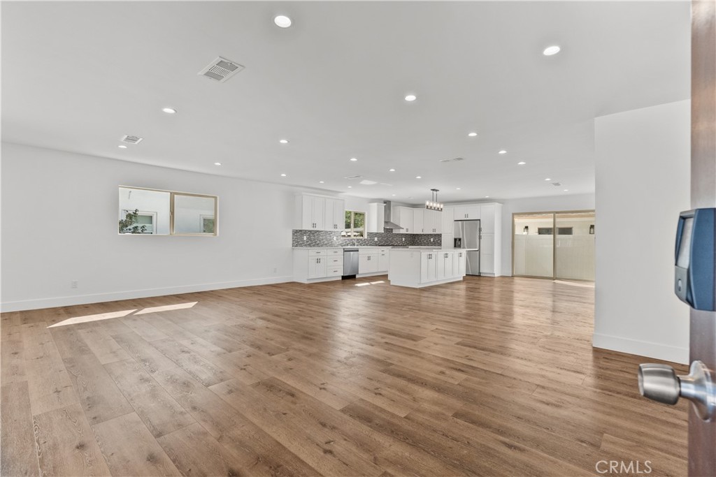 7419 Gloria Avenue Van Nuys, CA 91406 - Photo 5 of 51 a view of kitchen with kitchen island and stainless steel appliances