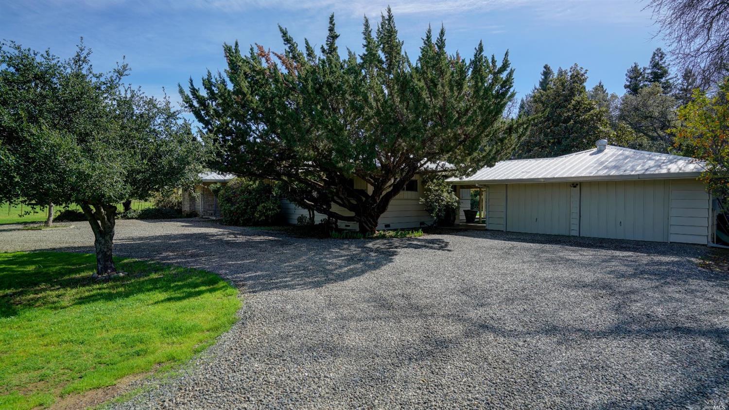 5412 Clayton Road Fairfield, CA 94534 - Photo 1 of 1 a view of a house with a yard and tree