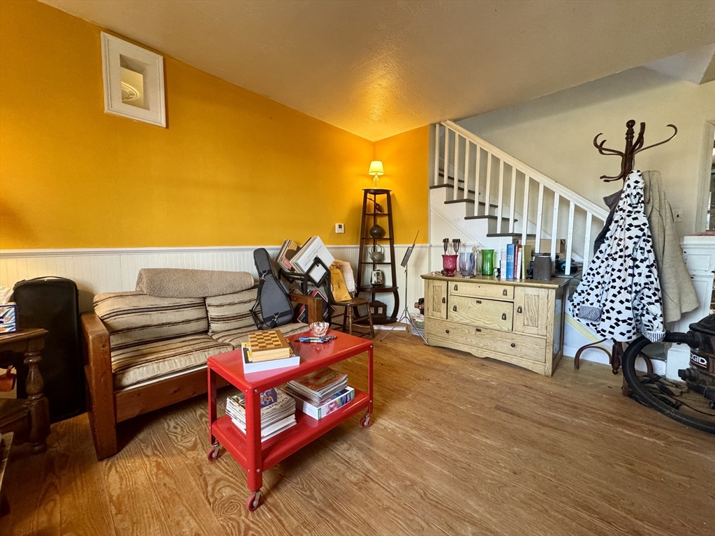 8 Ring Road Worthington, MA 01098 - Photo 3 of 14 a bedroom with furniture and a wooden floor