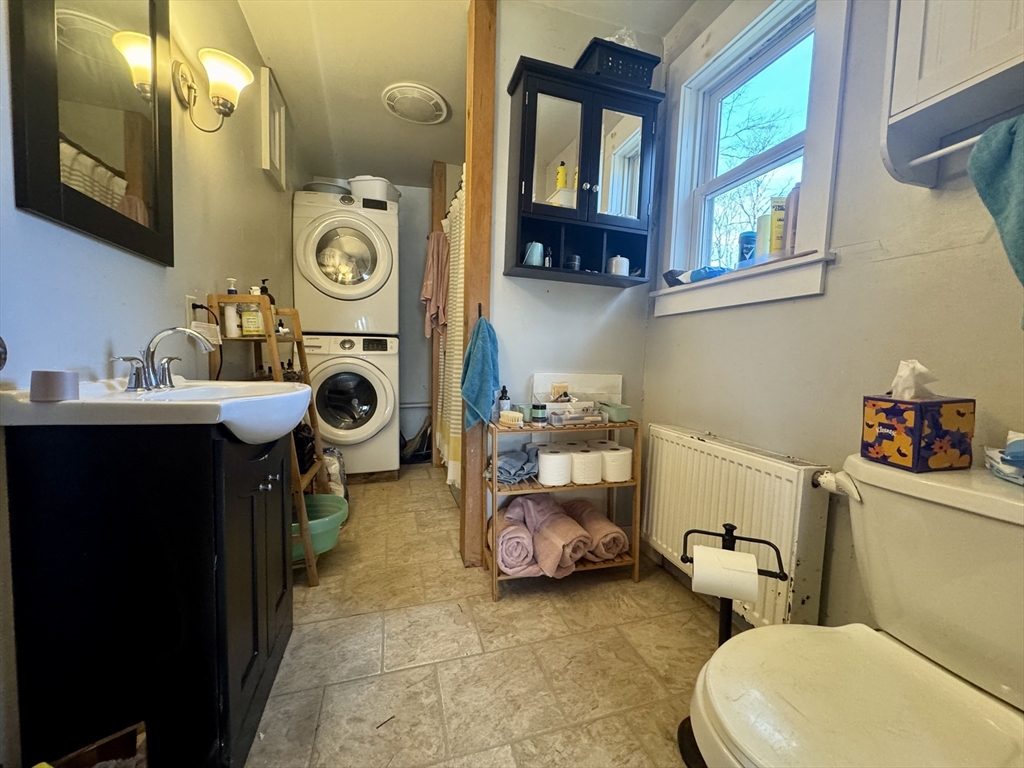 8 Ring Road Worthington, MA 01098 - Photo 6 of 14 a bathroom with a sink a toilet and a mirror