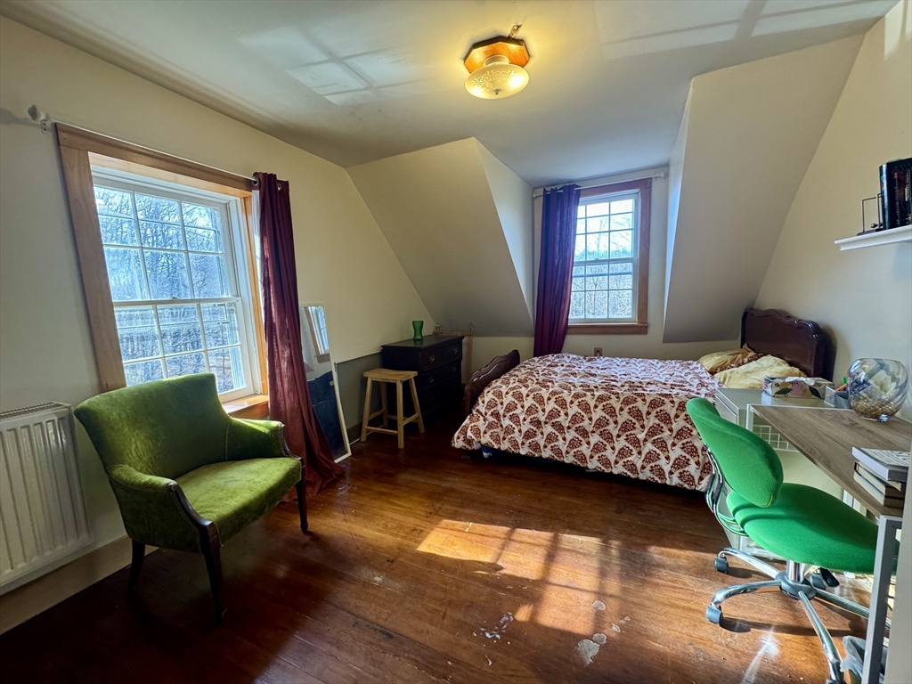 8 Ring Road Worthington, MA 01098 - Photo 8 of 14 a bedroom with a bed chair and a window