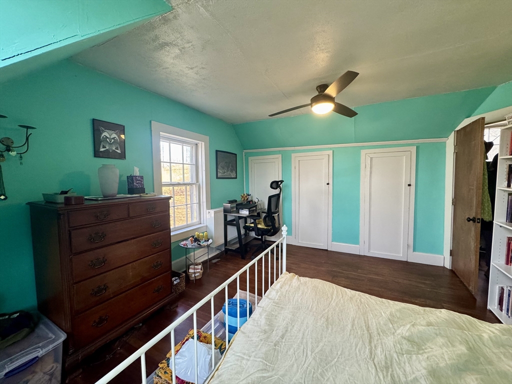 8 Ring Road Worthington, MA 01098 - Photo 9 of 14 a bedroom with furniture and a large window