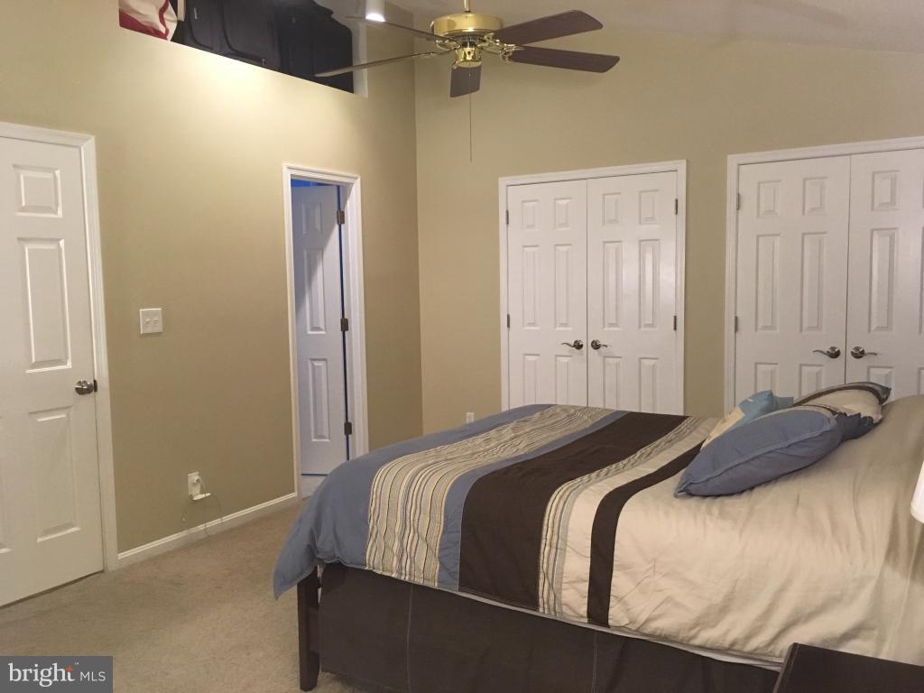 202 Rugby Road Fredericksburg, VA 22406 - Photo 11 of 29 a bedroom with a bed and window