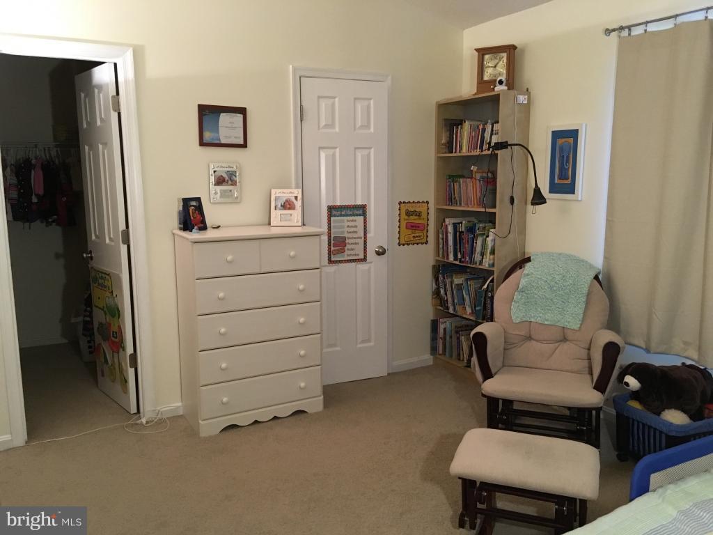 202 Rugby Road Fredericksburg, VA 22406 - Photo 16 of 29 a room with furniture and a couch