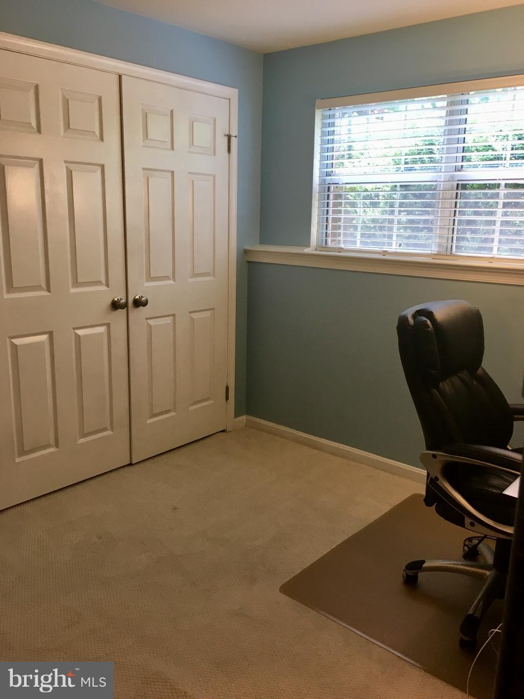 202 Rugby Road Fredericksburg, VA 22406 - Photo 20 of 29 a view of a workspace with furniture and a window