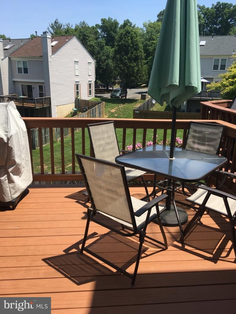 202 Rugby Road Fredericksburg, VA 22406 - Photo 7 of 29 a view of a chairs and table on the terrace