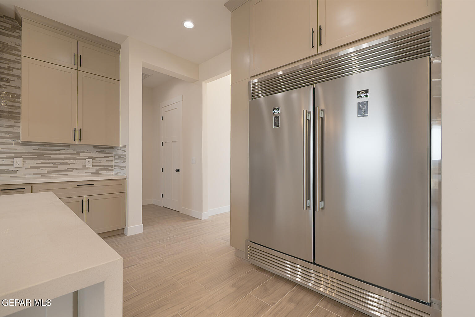 6035 Dusty Prints Road Las Cruces, NM 88007 - Photo 20 of 61 6025-Dusty-Prints-Kitchen-Fridge