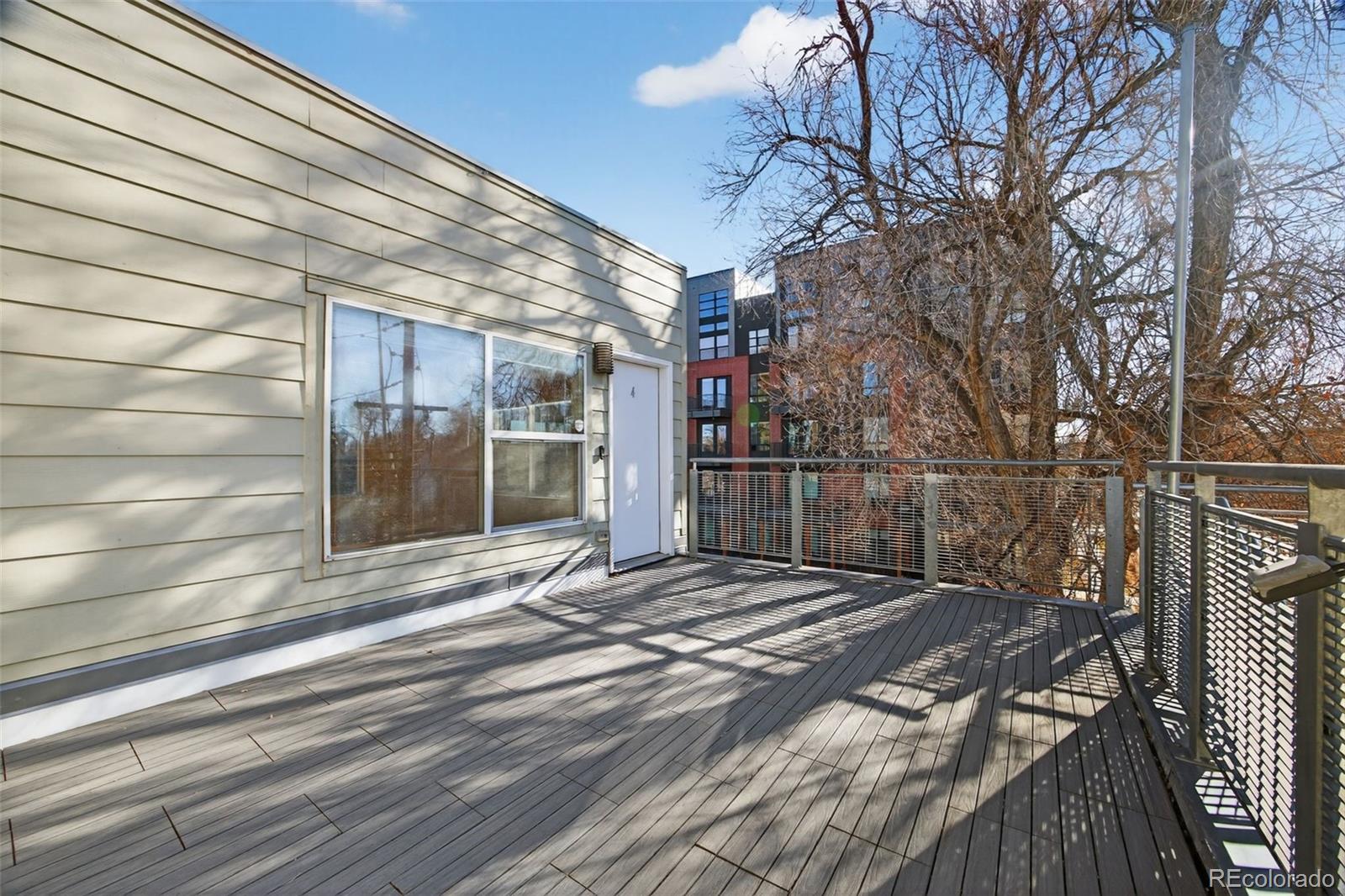 2389 South High Street, Unit 4 Denver, CO 80210 - Photo 22 of 32 a view of a backyard of a house
