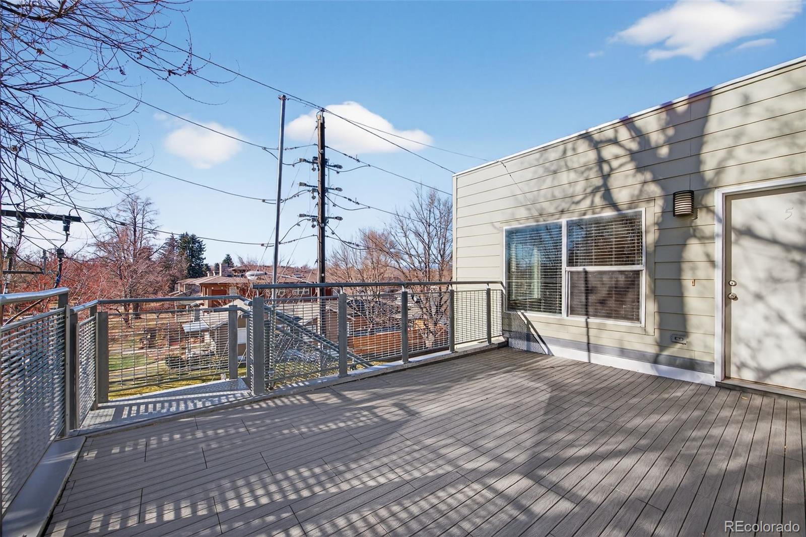 2389 South High Street, Unit 4 Denver, CO 80210 - Photo 24 of 32 a view of livingroom with an outdoor space