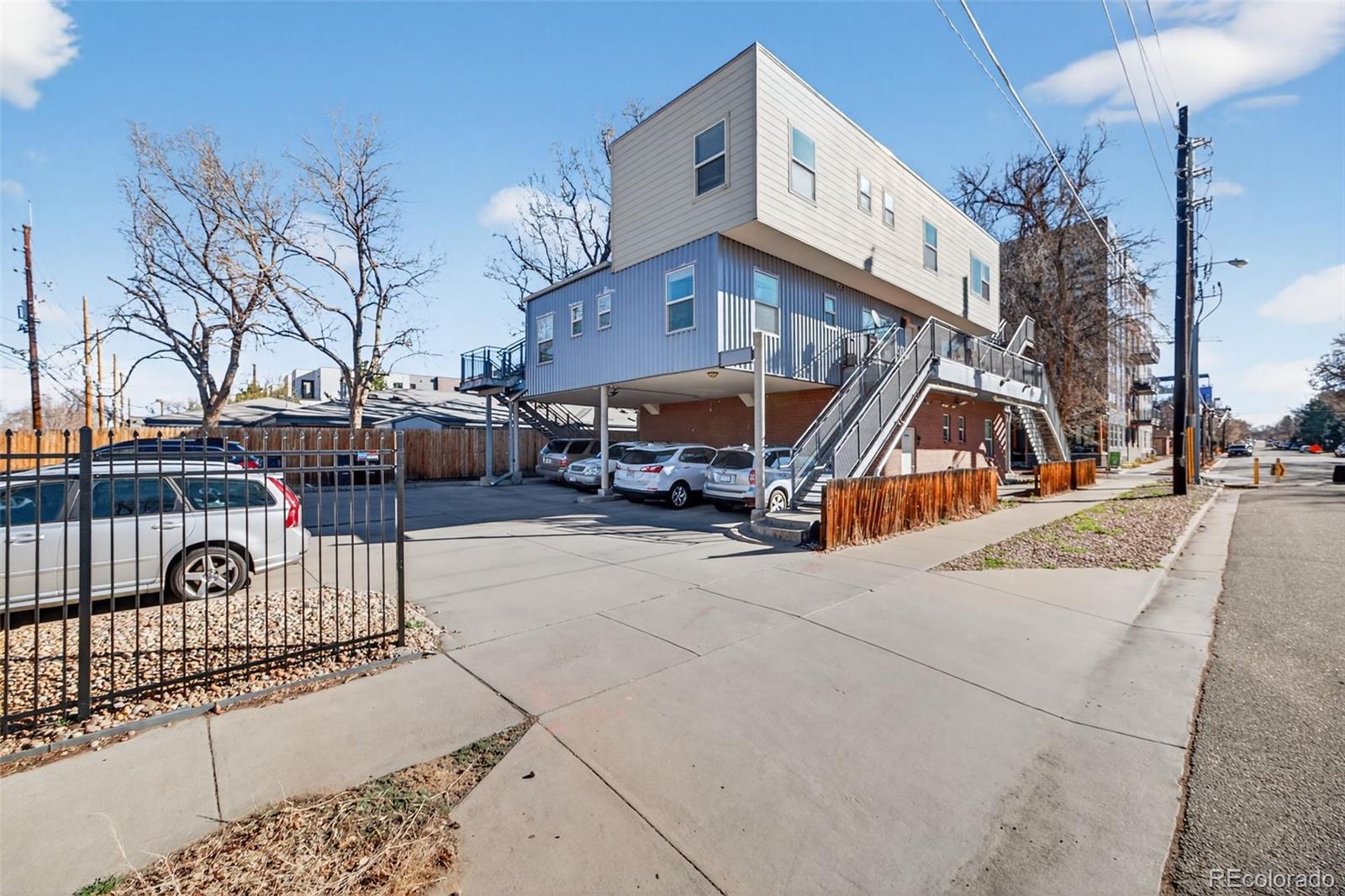 2389 South High Street, Unit 4 Denver, CO 80210 - Photo 3 of 32 a view of a building with sitting area