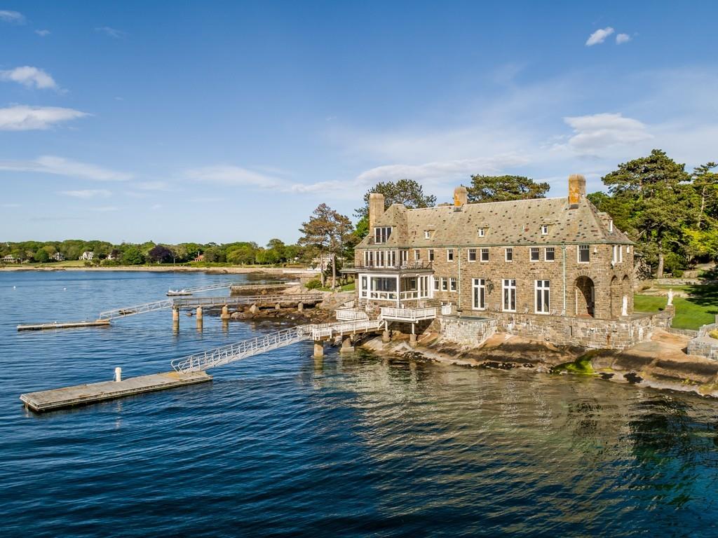 71 Eastern Point Boulevard Gloucester, MA 01930 - Photo 1 of 40 a view of a swimming pool with an ocean view