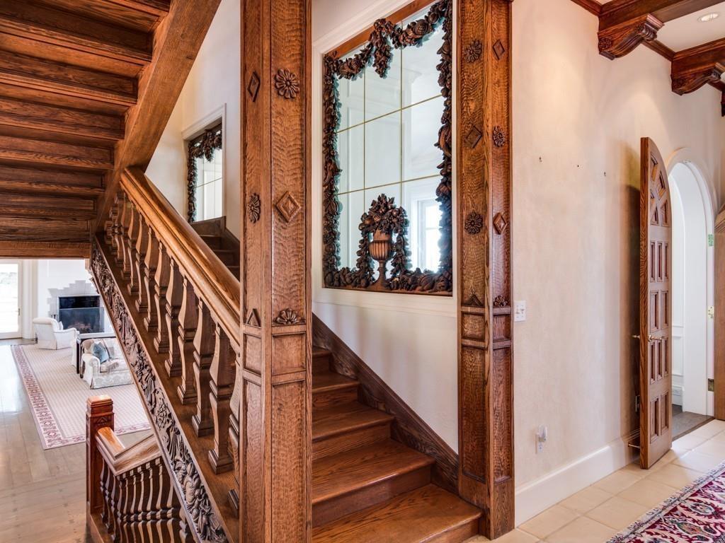 71 Eastern Point Boulevard Gloucester, MA 01930 - Photo 13 of 40 a view of staircase with lots of frames on wall and a window