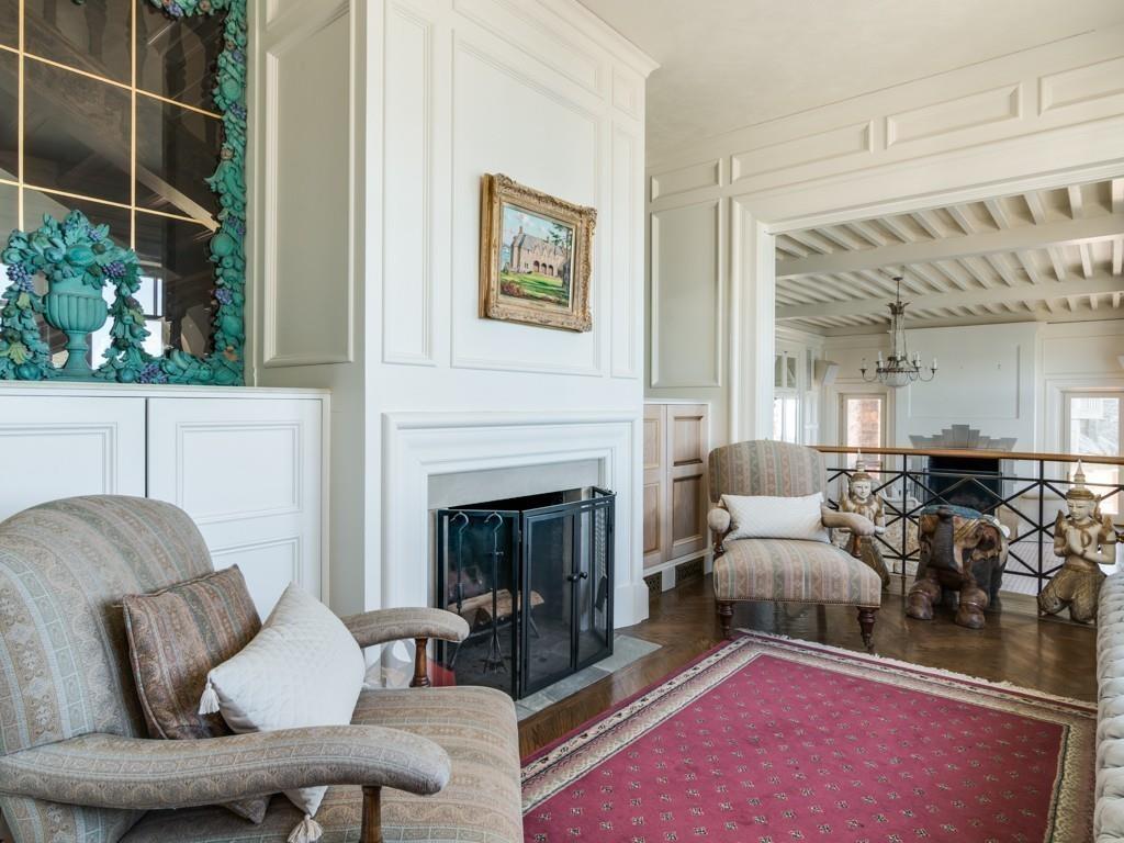 71 Eastern Point Boulevard Gloucester, MA 01930 - Photo 16 of 40 a living room with furniture and a fireplace