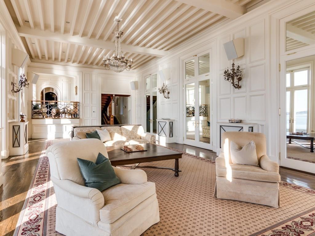 71 Eastern Point Boulevard Gloucester, MA 01930 - Photo 20 of 40 a living room with furniture and a large window