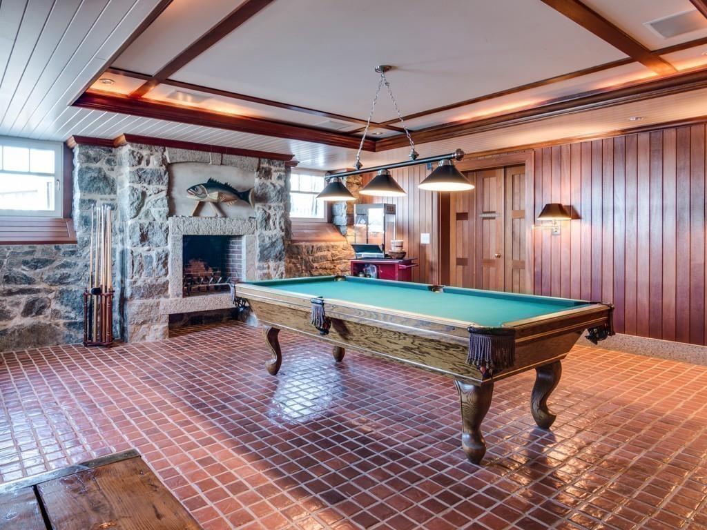 71 Eastern Point Boulevard Gloucester, MA 01930 - Photo 26 of 40 a outdoor space with chairs and a fireplace