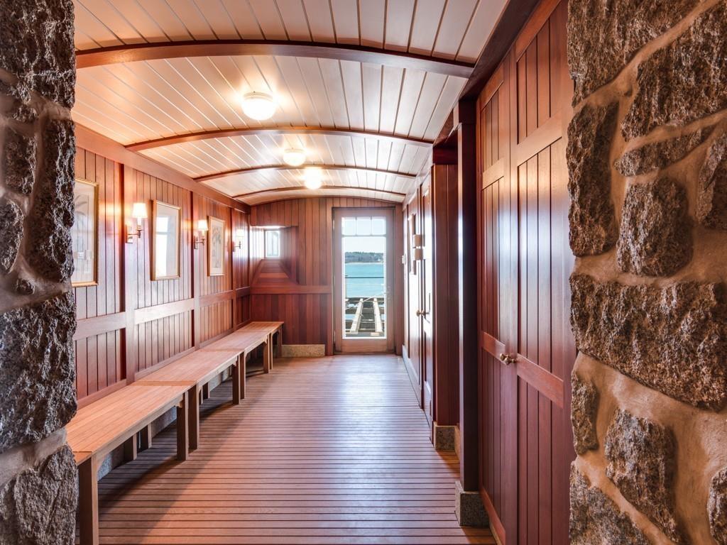 71 Eastern Point Boulevard Gloucester, MA 01930 - Photo 27 of 40 a view of front door with hallway and wooden floor