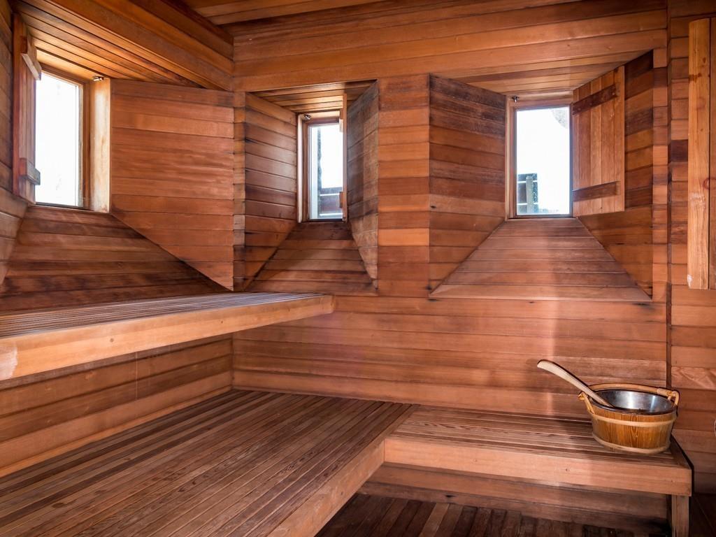 71 Eastern Point Boulevard Gloucester, MA 01930 - Photo 28 of 40 a view of water heater room with wooden floor