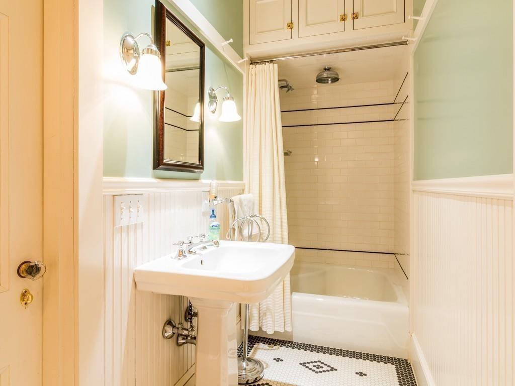 71 Eastern Point Boulevard Gloucester, MA 01930 - Photo 33 of 40 a bathroom with a sink and a mirror