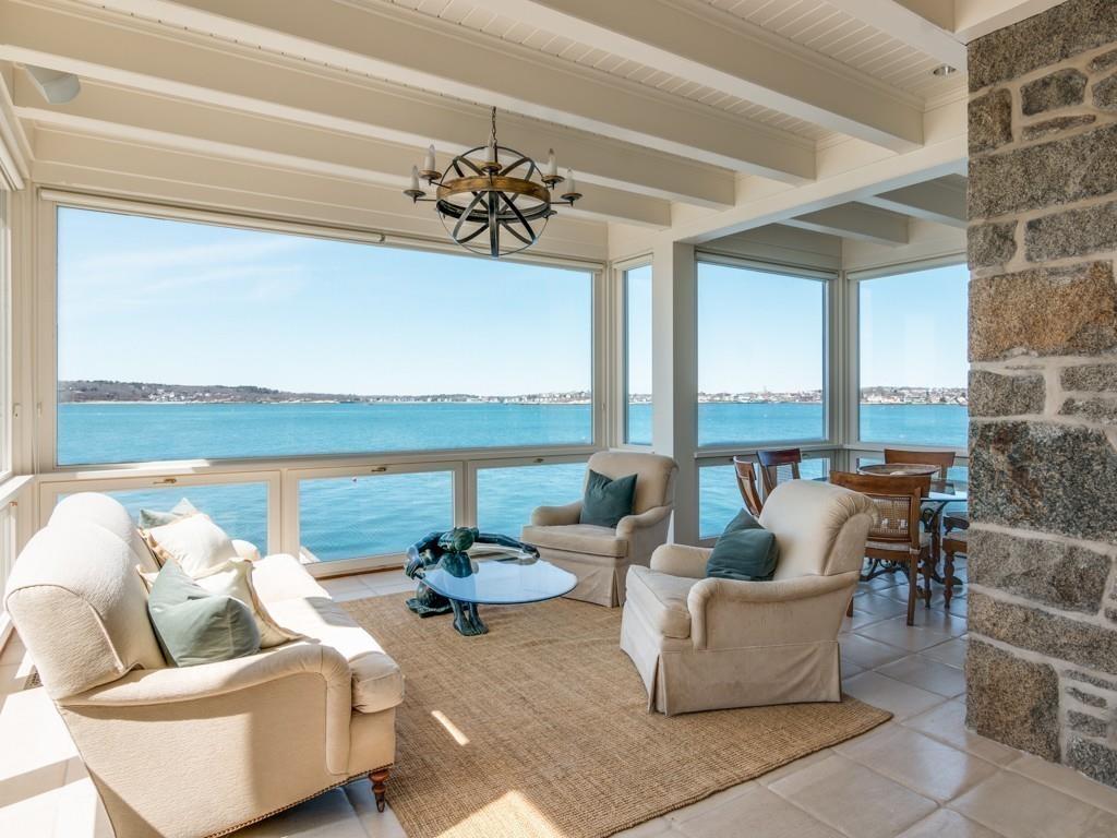 71 Eastern Point Boulevard Gloucester, MA 01930 - Photo 5 of 40 a living room with furniture and a large window