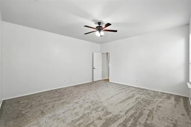 a view of a big room with carpet