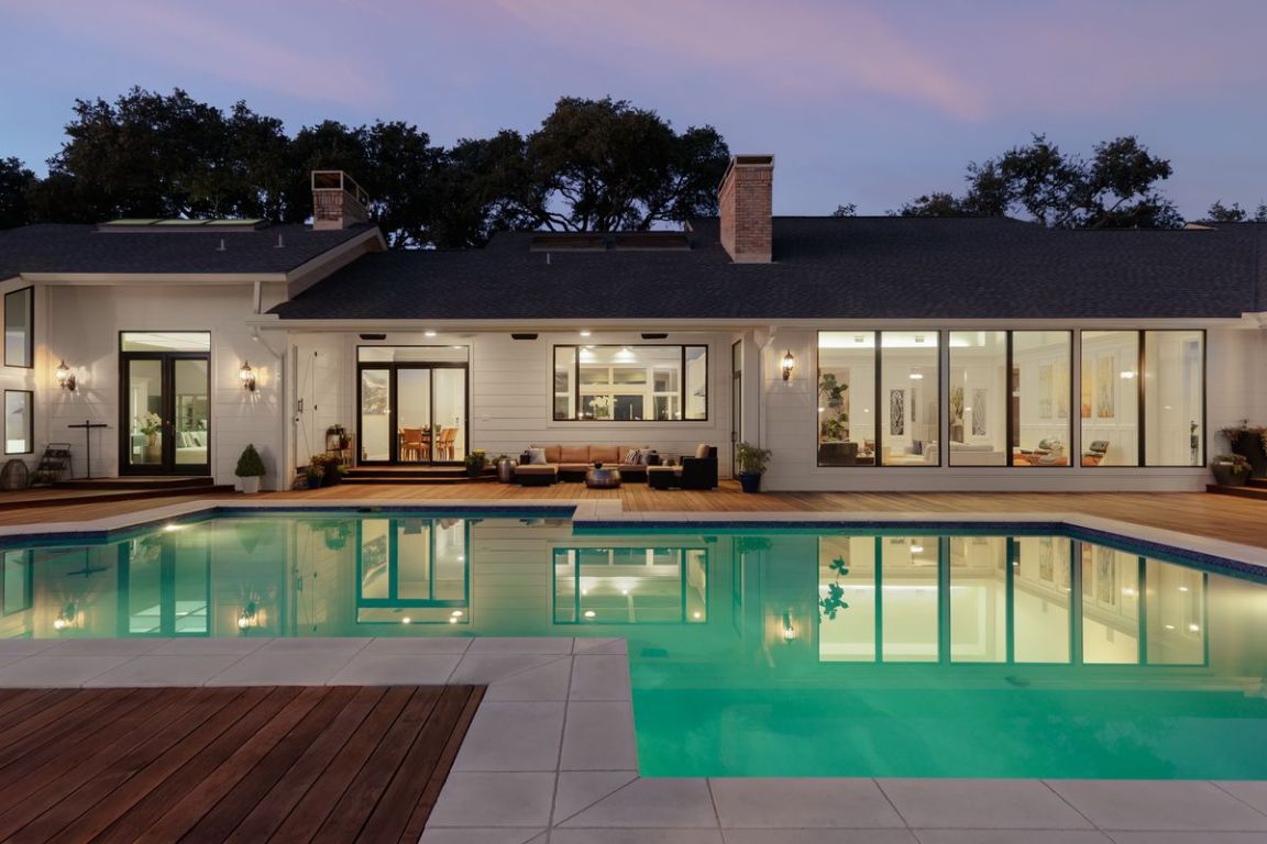 17 Cousteau Lane Austin, TX 78746 - Photo 1 of 1 a view of a swimming pool with a patio