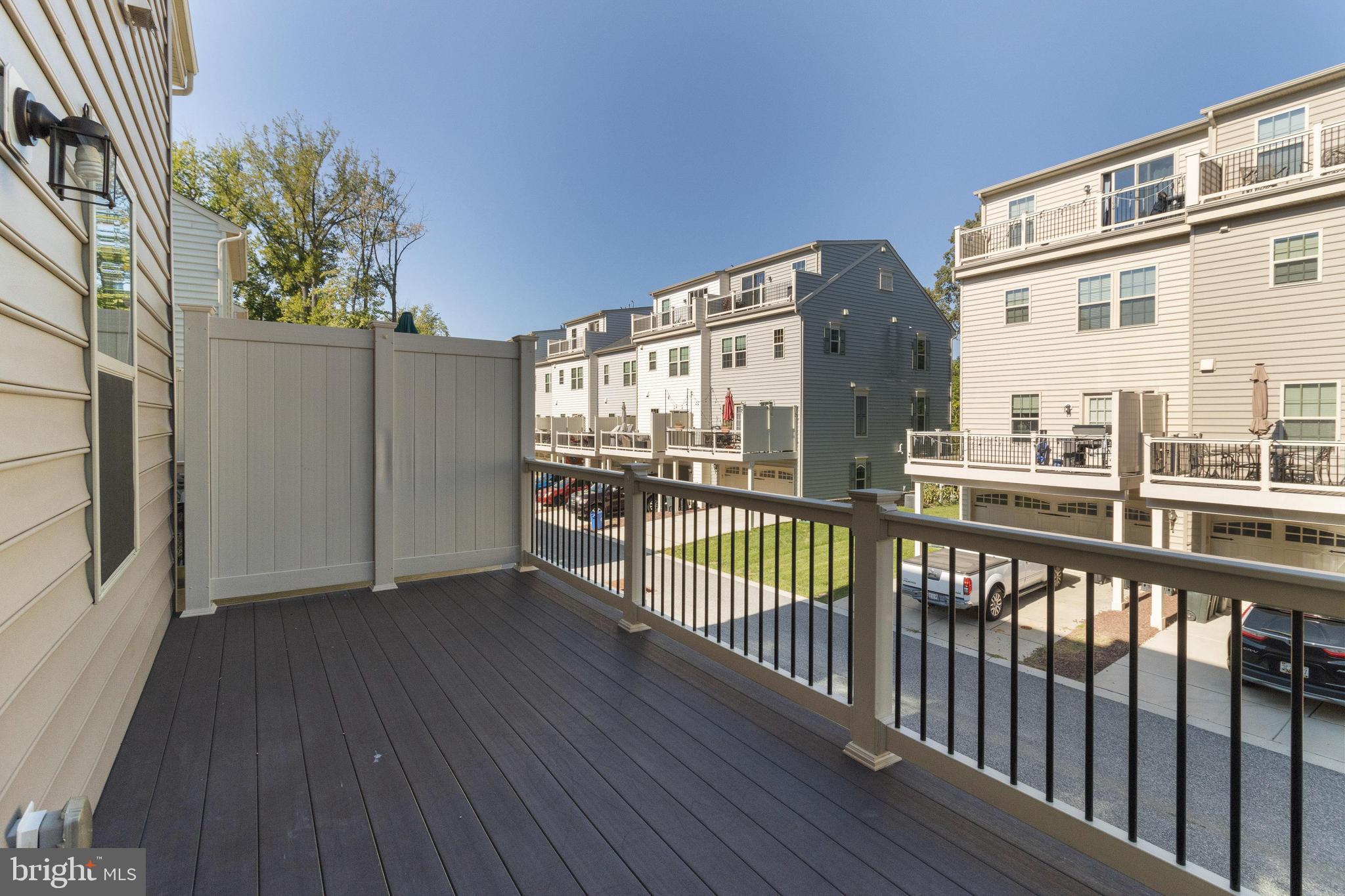 1044 Ramble Run Road Baltimore, MD 21220 - Photo 17 of 37 a view of a balcony with wooden floor