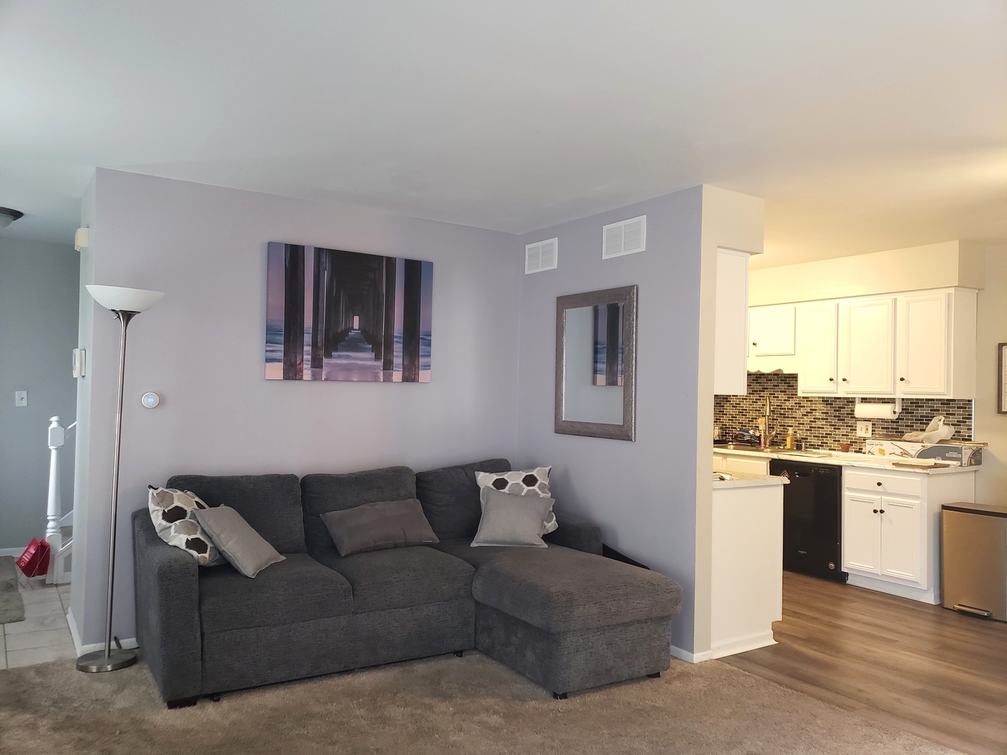 524 Sandhurst Lane South Elgin, IL 60177 - Photo 3 of 32 a living room with a couch and a stove top oven