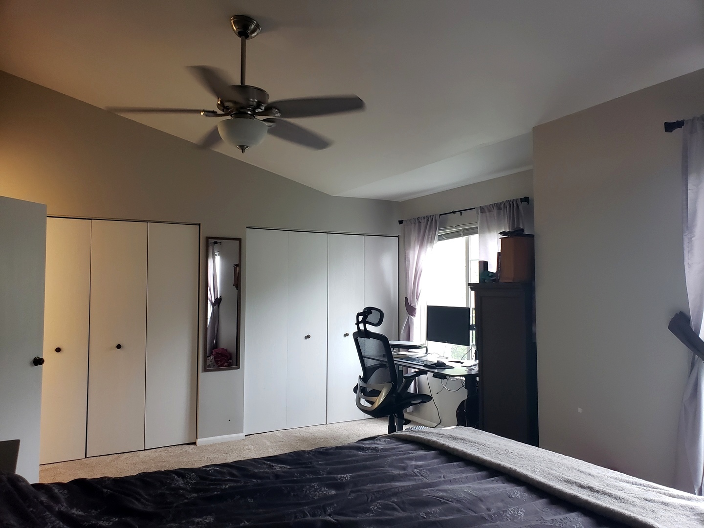 524 Sandhurst Lane South Elgin, IL 60177 - Photo 10 of 32 a view of a room with wooden floor a ceiling fan and windows