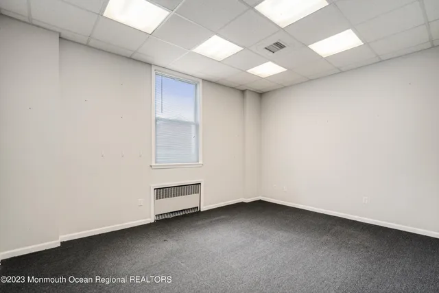 an empty room with cabinet