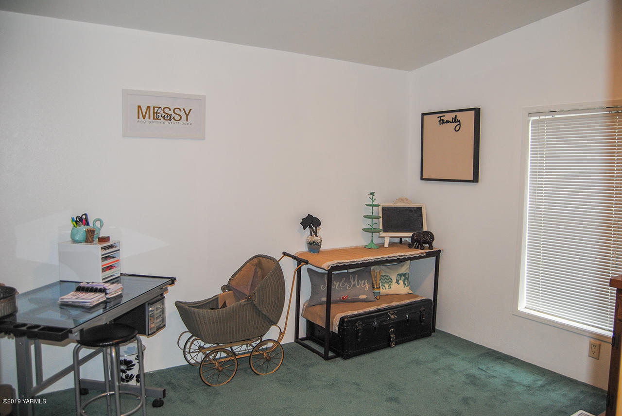 4971 Beam Road Granger, WA 98932 - Photo 11 of 24 a view of a workspace with furniture