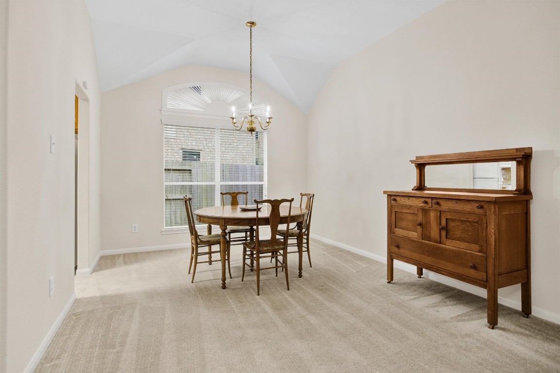 6031 Skyhaven Lane Spring, TX 77379 - Photo 11 of 34 Large dining room offers flexible seating.