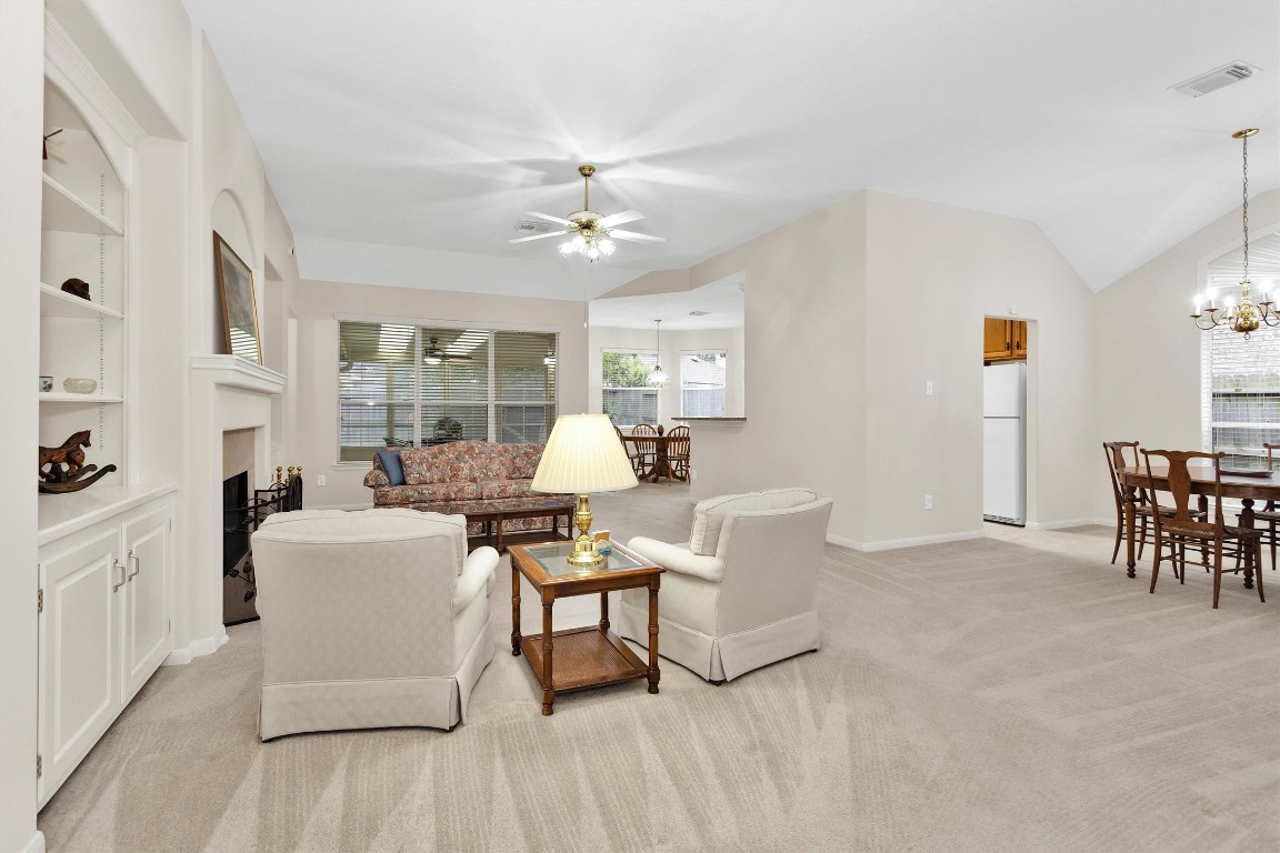 6031 Skyhaven Lane Spring, TX 77379 - Photo 12 of 34 From the entry, you can see the dining room as well as the den.