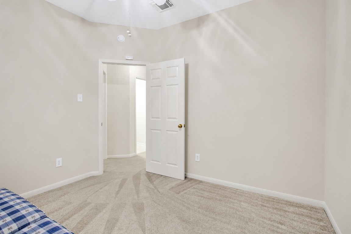 6031 Skyhaven Lane Spring, TX 77379 - Photo 22 of 34 Bedroom 2 with ceiling fan.