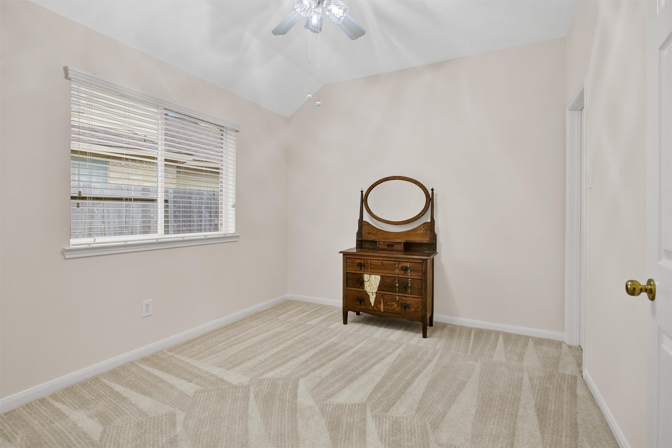 6031 Skyhaven Lane Spring, TX 77379 - Photo 23 of 34 Bedroom 3 offers a ceiling fan as well.