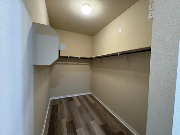 a view of a house with swimming pool in front of it