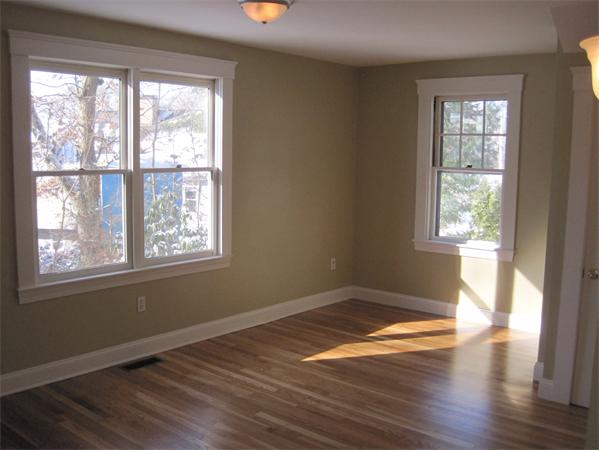 76 Ridgeway Avenue Needham, MA 02492 - Photo 4 of 20 a view of an empty room with wooden floor and a window