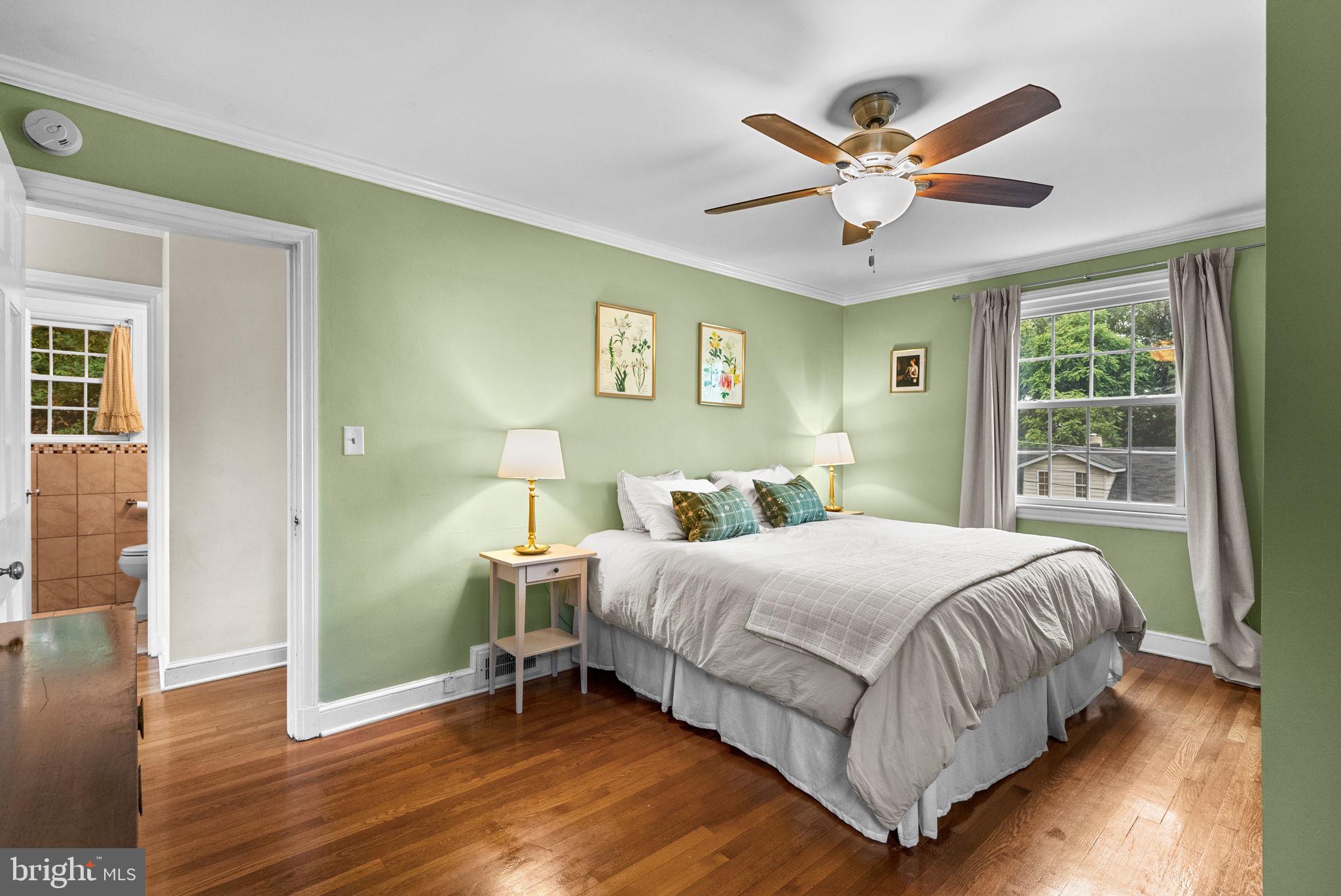 3403 Varnum Street Brentwood, MD 20722 - Photo 13 of 20 a bedroom with a bed and a window