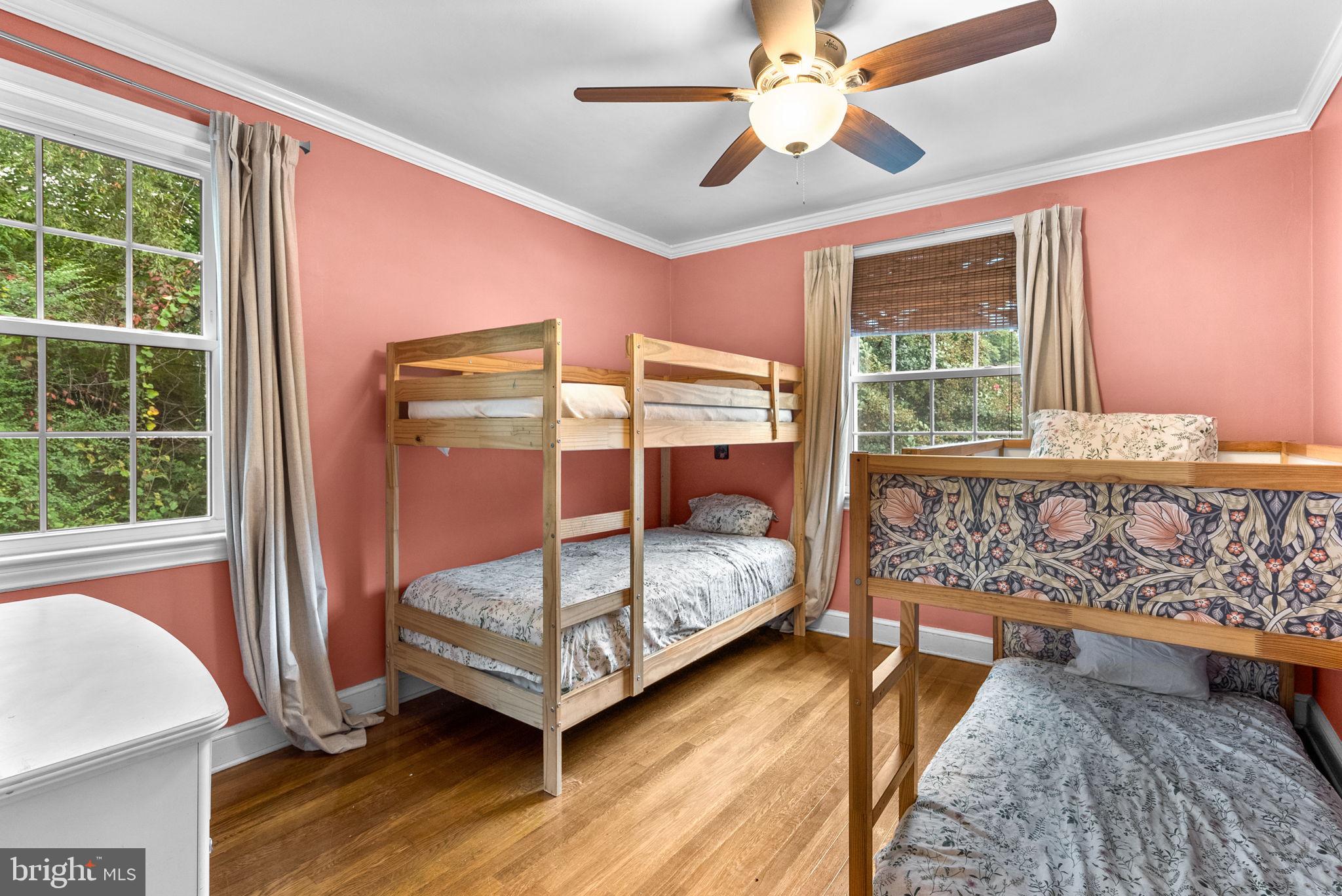 3403 Varnum Street Brentwood, MD 20722 - Photo 15 of 20 a bedroom with a bed and a window