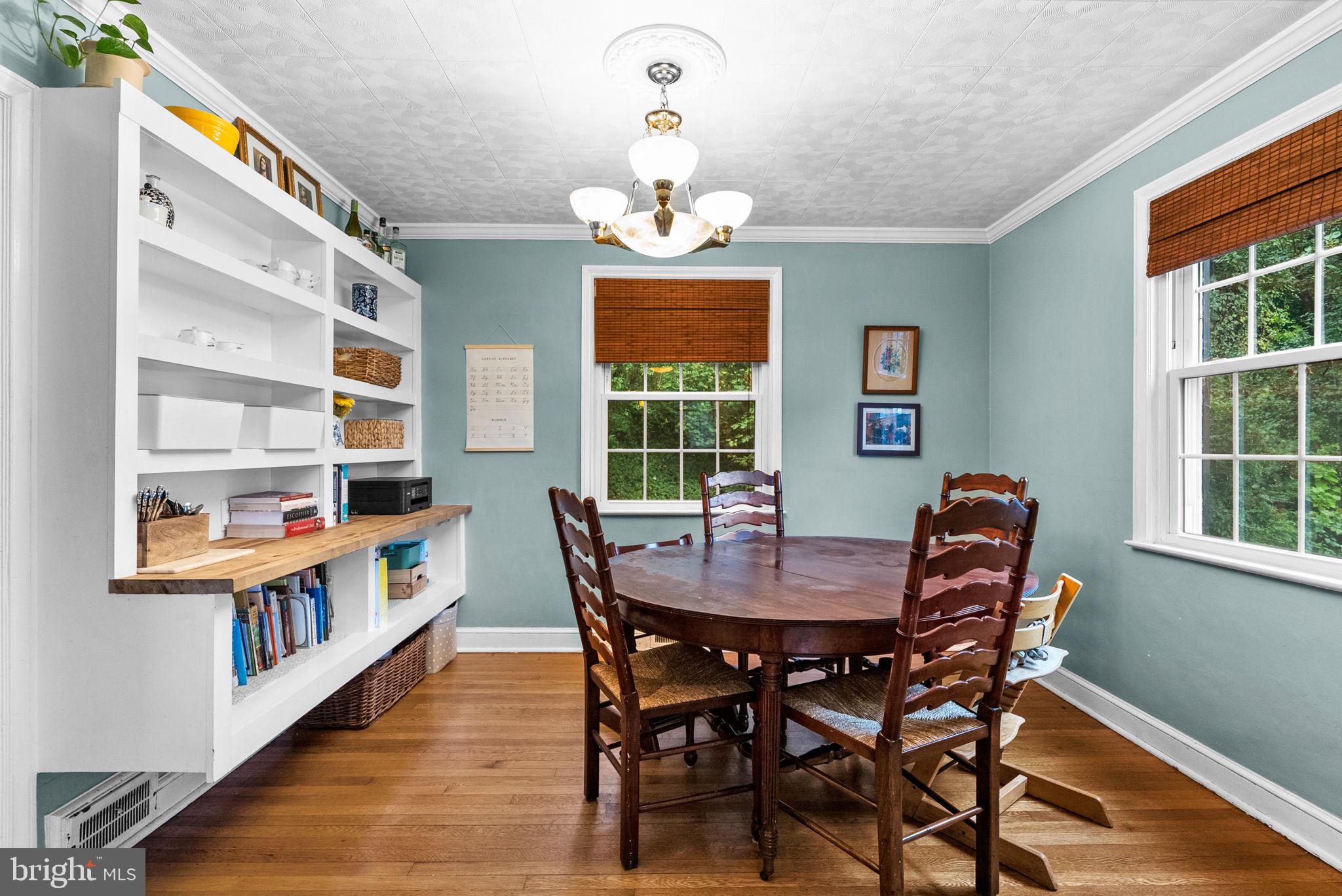 3403 Varnum Street Brentwood, MD 20722 - Photo 6 of 20 a dining room with furniture a rug and wooden floor