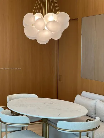 a bathroom with a sink mirror and toilet