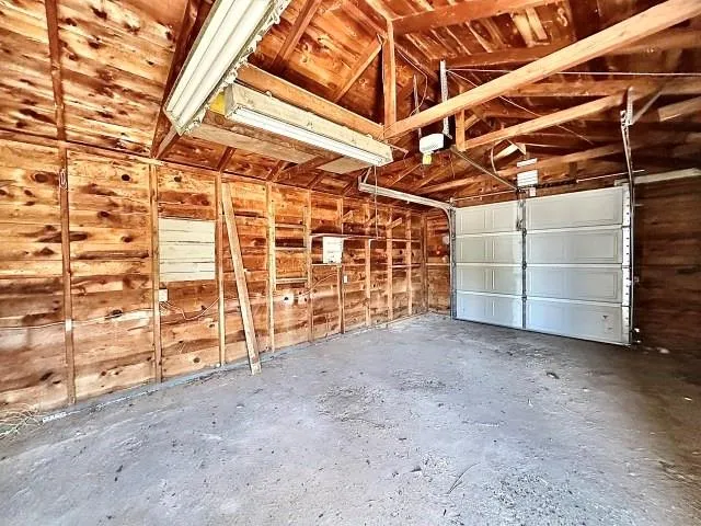 a view of an empty room with storage