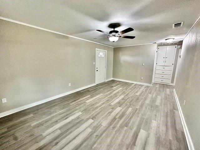 415 Hendrickson Street Goldsmith, TX 79741 - Photo 9 of 17 wooden floor in an empty room