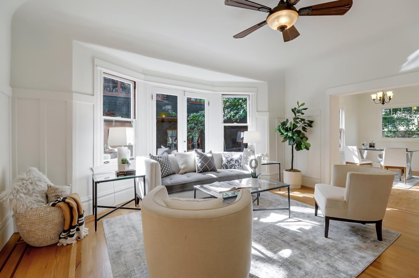 2614 Etna Street Berkeley, CA 94704 - Photo 11 of 59 a living room with furniture and a large window